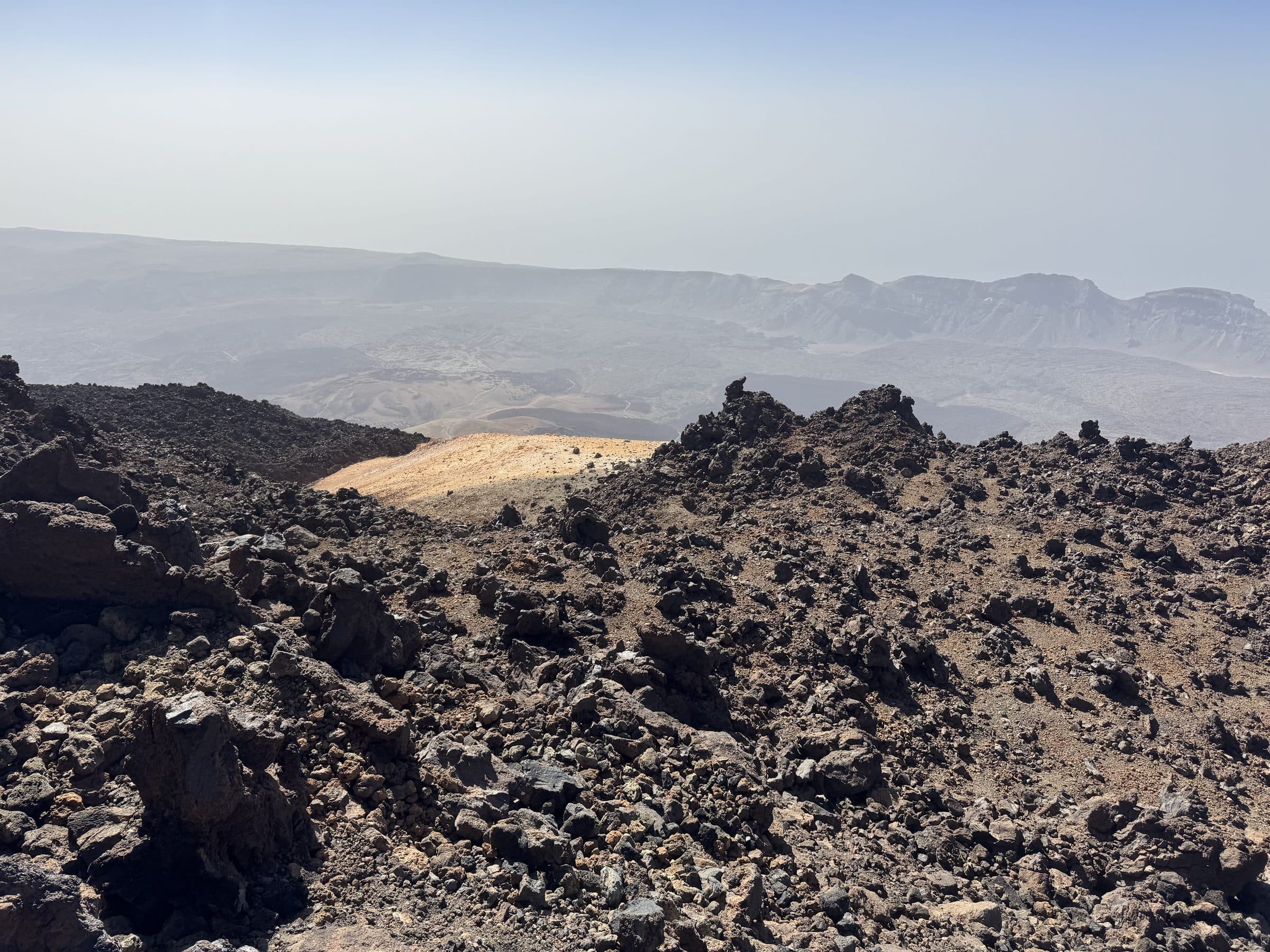 A hazy caldera view from Teide, the distant mountains obscured by calima.